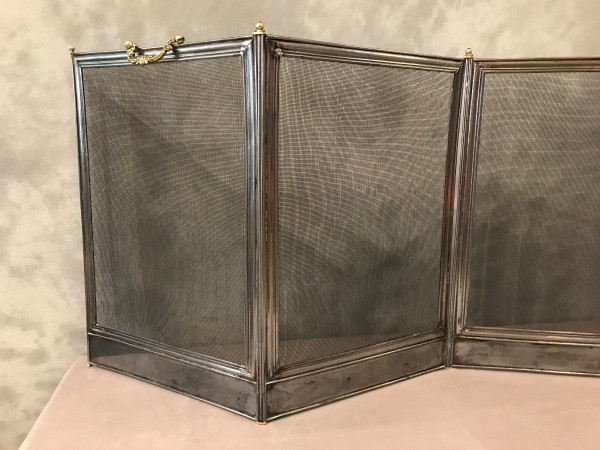 Antique polished iron mantelpiece from the 19th century Charles X period