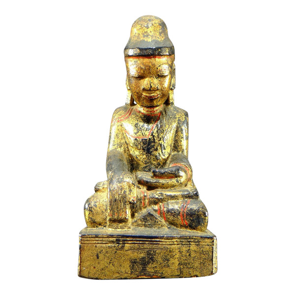 Burma, 19th century, Mandalay Buddha in carved and gilded wood on a black lacquer background.