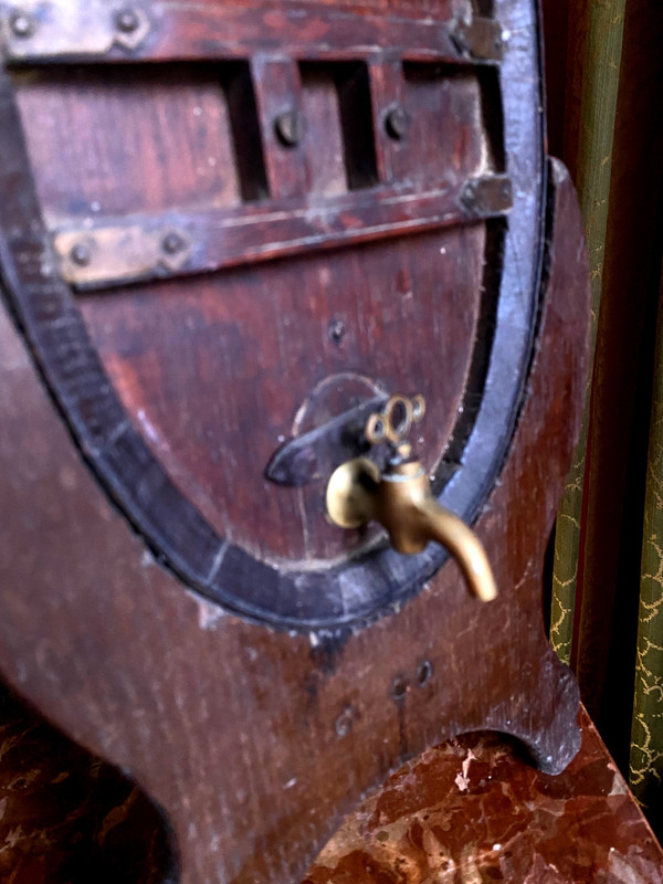 Oak vinegar table barrel from the end of the 19th century on its lightning-shaped tripod