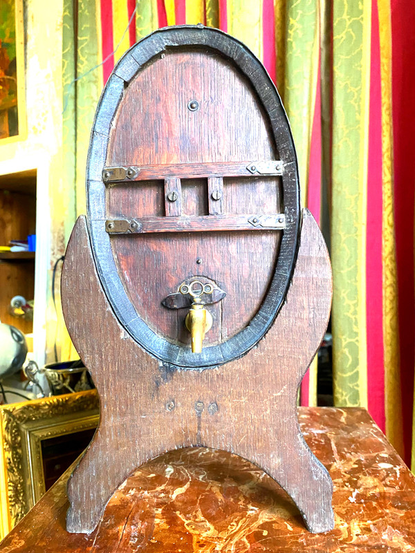 Oak vinegar table barrel from the end of the 19th century on its lightning-shaped tripod