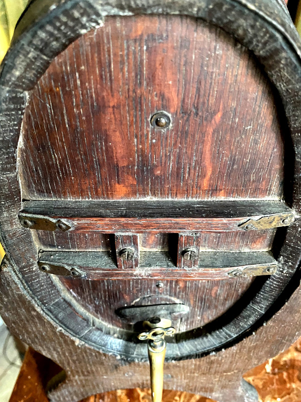 Oak vinegar table barrel from the end of the 19th century on its lightning-shaped tripod