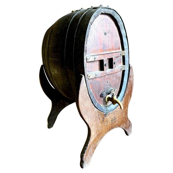 Oak vinegar table barrel from the end of the 19th century on its lightning-shaped tripod