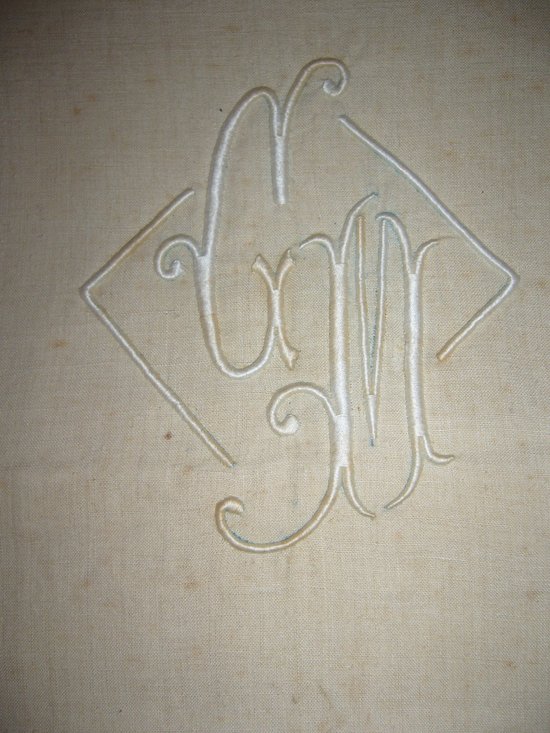 Old embroidered sheet in monogrammed linen