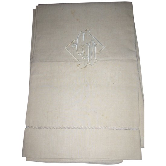 Old embroidered sheet in monogrammed linen