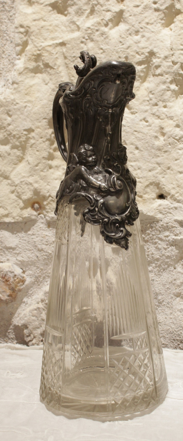 Cut crystal ewer and putti pewter mount circa 1900