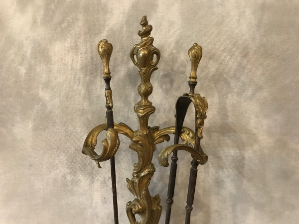 Beautiful large bronze fireplace set from the 19th century in Louis XV style
