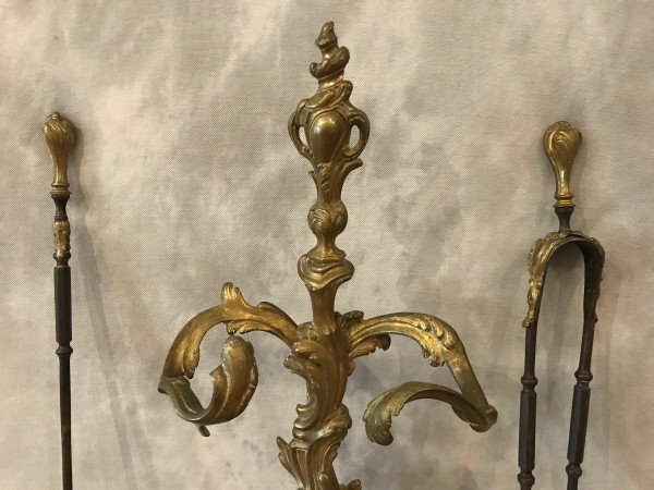 Beautiful large bronze fireplace set from the 19th century in Louis XV style