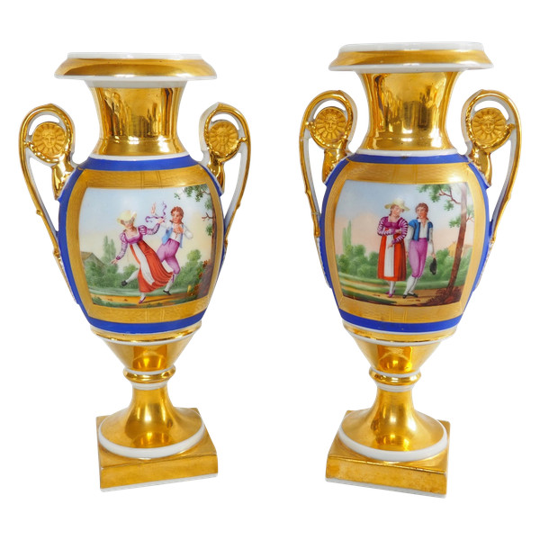 Pair of Empire period vases in Paris porcelain and biscuit, blue and gold polychrome decoration
