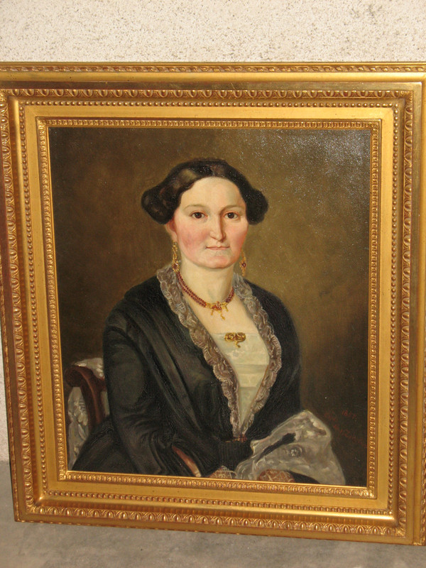 Pair of bust portraits of a couple signed M.V. Ziegler oil on canvas, mid-19th century