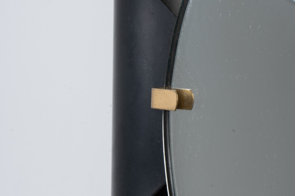 Specchio in metallo curvato e ottone dorato. Anni '70.