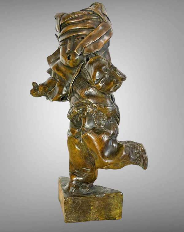 PATINATED BRONZE SIGNED BY “MARIE FILLON 1953” REPRESENTING A DANCING TODDLER