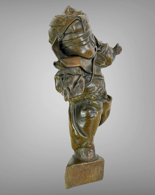 PATINATED BRONZE SIGNED BY “MARIE FILLON 1953” REPRESENTING A DANCING TODDLER