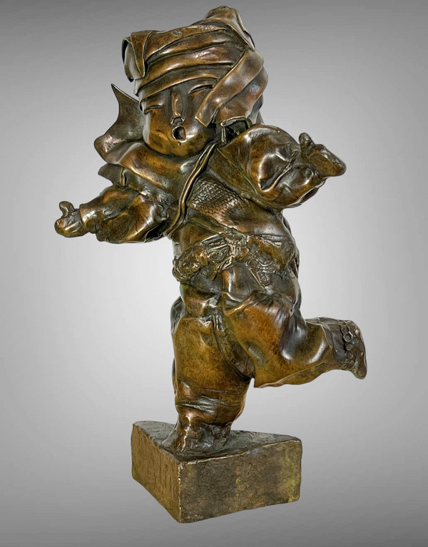 PATINATED BRONZE SIGNED BY “MARIE FILLON 1953” REPRESENTING A DANCING TODDLER