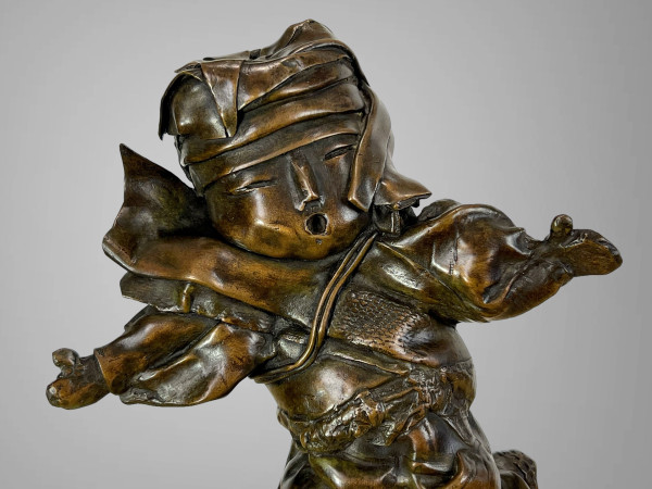 PATINATED BRONZE SIGNED BY “MARIE FILLON 1953” REPRESENTING A DANCING TODDLER