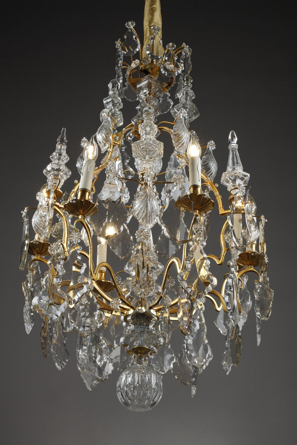 Lampadario a gabbia a sei luci, in bronzo dorato, decorato con nappe e pugnali in cristallo molato