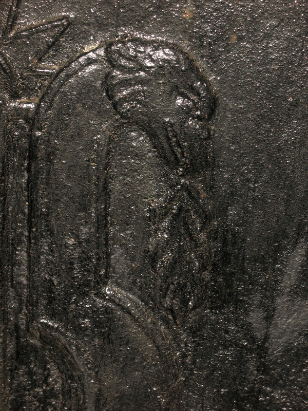 Large cast-iron fireback from the 18th century decorated with coat of arms and lyre