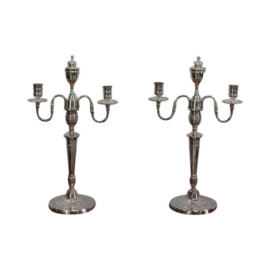 Coppia di candelabri in bronzo argentato - anni '60