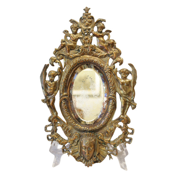 Specchio in bronzo decorato con putti e mascaroni fine XIX secolo