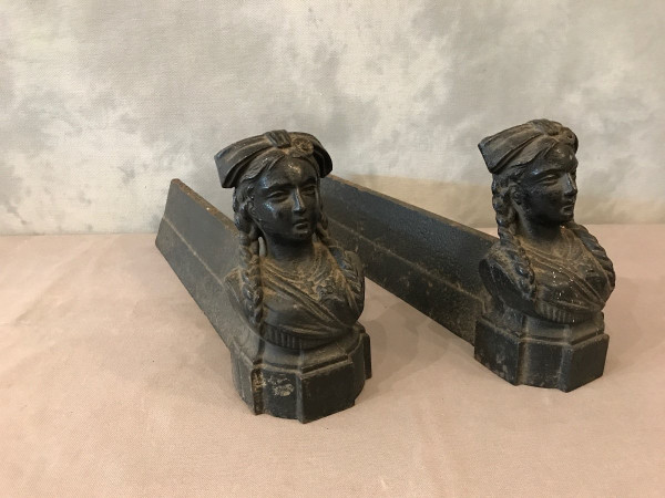 Pair of old cast iron andirons from the 19th century