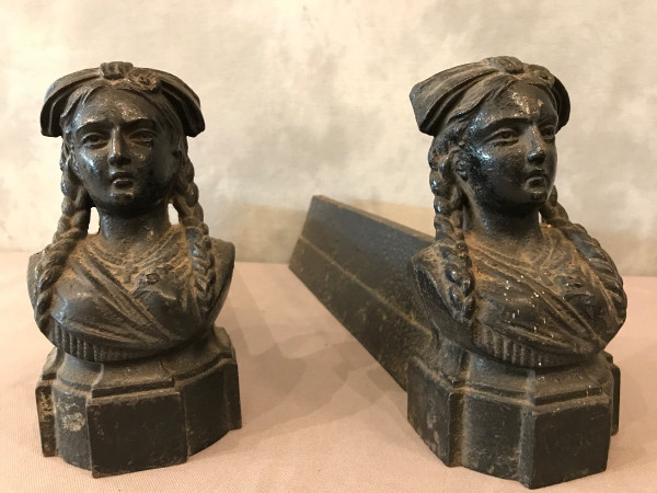 Pair of old cast iron andirons from the 19th century