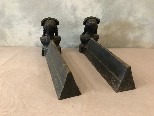Pair of old cast iron andirons from the 19th century