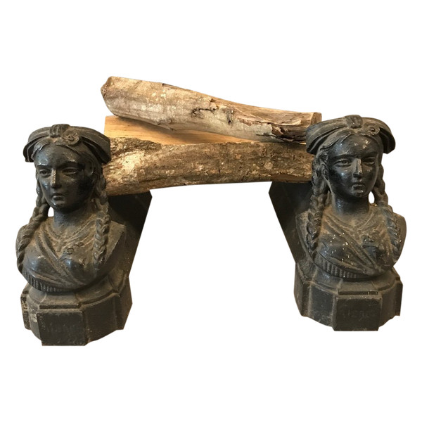 Pair of old cast iron andirons from the 19th century