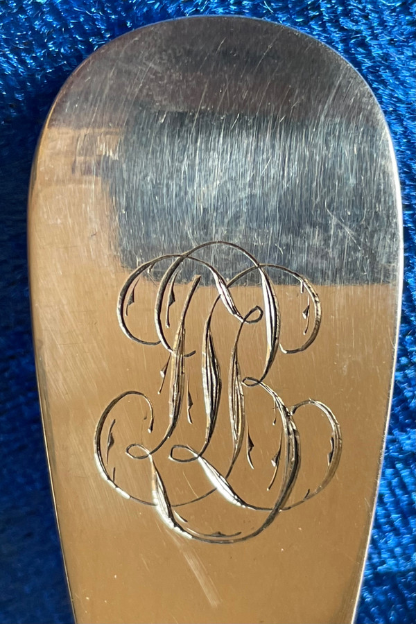 Solid silver shaker.