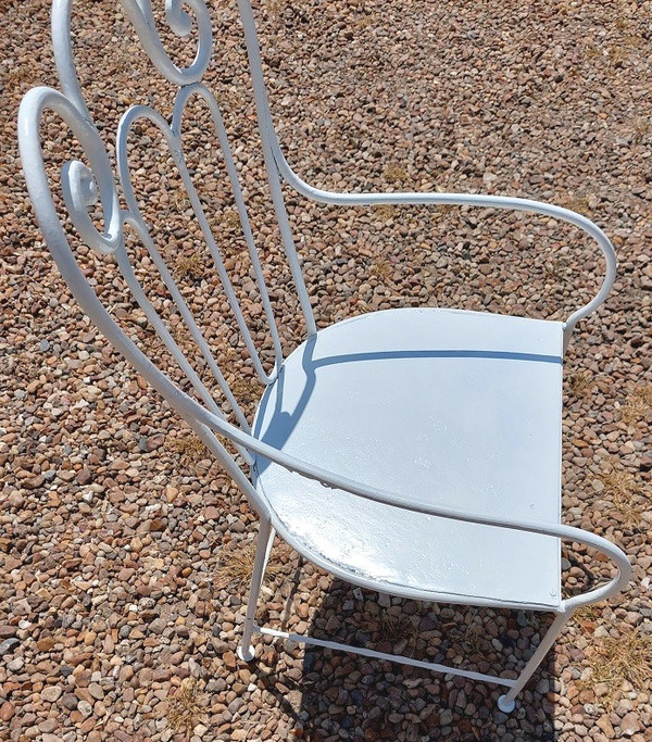 Fauteuil de jardin en fer forgé assise aussi début 1900 