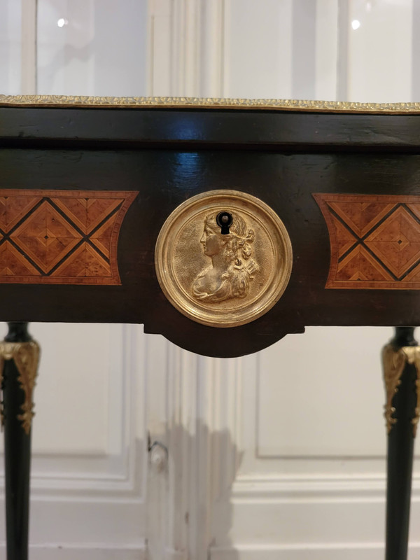 Small table in marquetry of various species and Napoleon II bronze