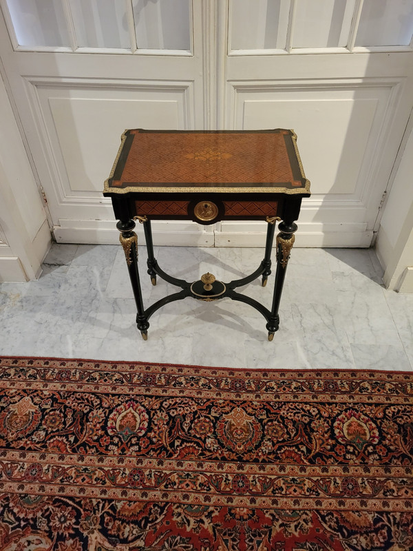 Small table in marquetry of various species and Napoleon II bronze