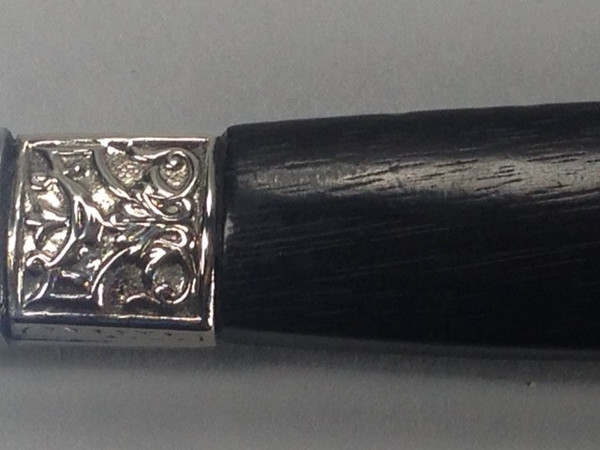 12 Table knives black handle with silver ferrules