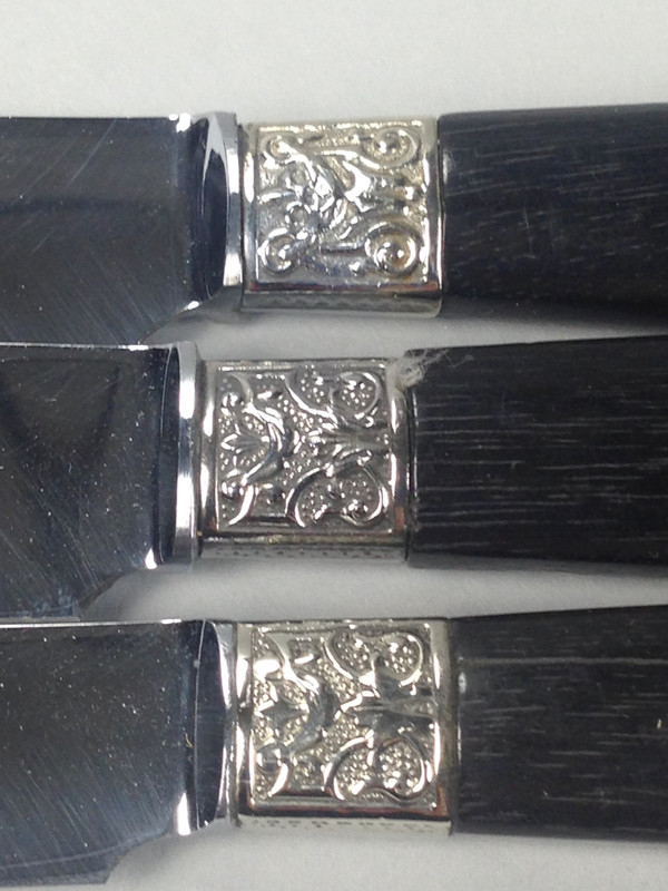 12 Table knives black handle with silver ferrules