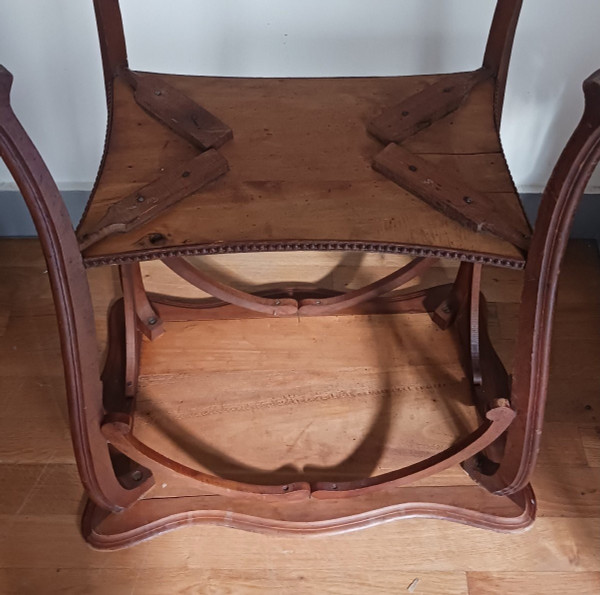 Art Nouveau work - walnut saddle table with spacer - circa 1900