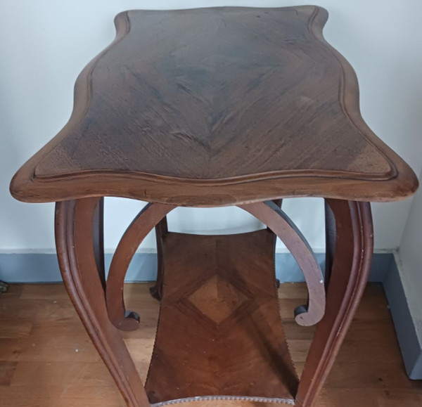 Art Nouveau work - walnut saddle table with spacer - circa 1900