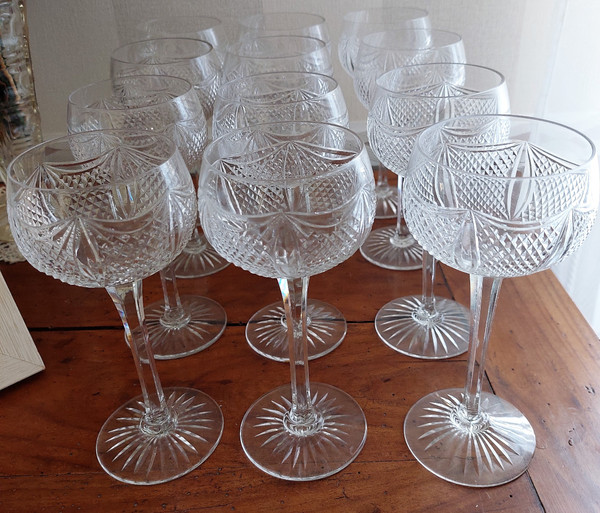 Series of 12 cut crystal stemmed wine glasses from the early 20th century