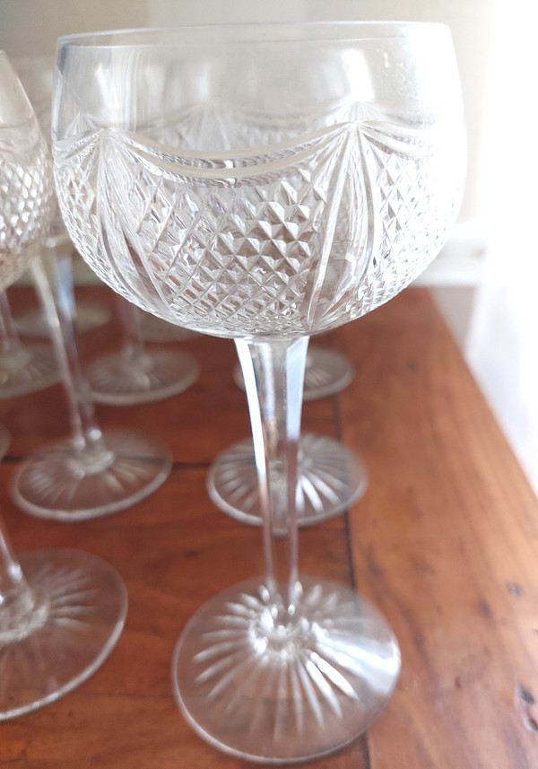 Series of 12 cut crystal stemmed wine glasses from the early 20th century