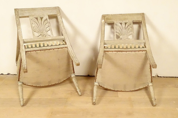 Coppia di poltrone Directoire in legno laccato con sedute a conchiglia Palmette Fine XVIII secolo