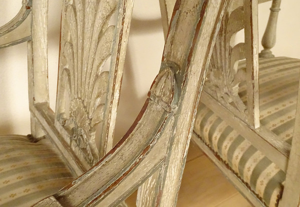 Coppia di poltrone Directoire in legno laccato con sedute a conchiglia Palmette Fine XVIII secolo