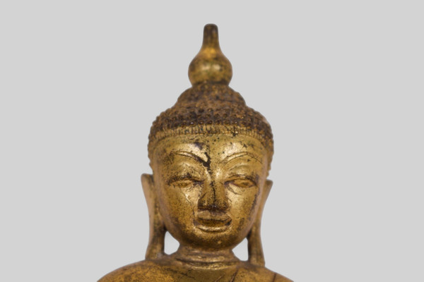 Bouddha Shan en bronze doré.