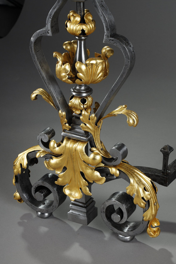 VERY LARGE PAIR OF WROUGHT IRON MANTELPIECES WITH FOLIAGE, MASK AND SCROLL MOTIFS