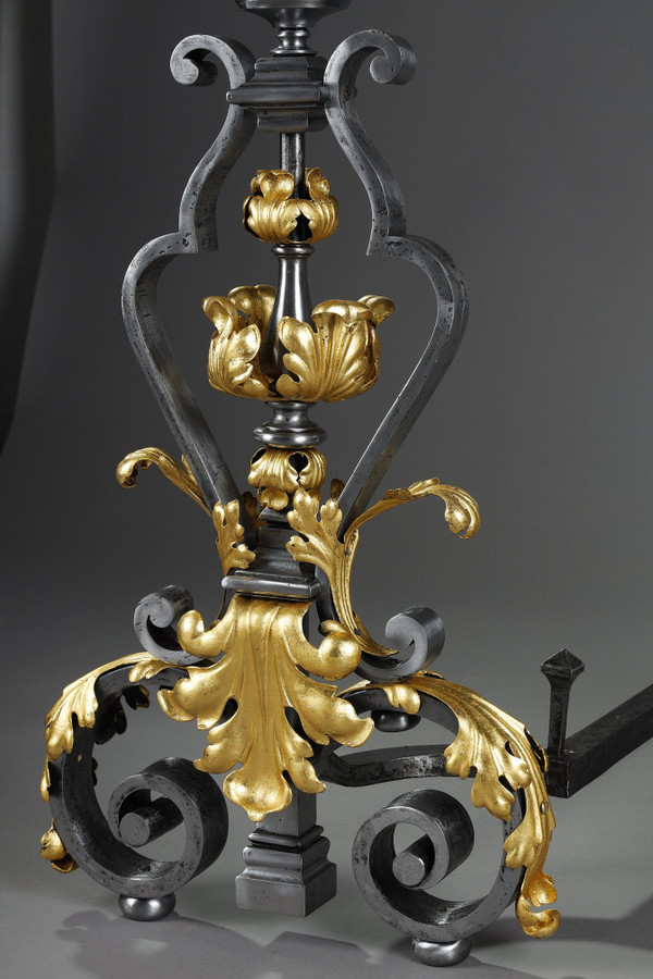 VERY LARGE PAIR OF WROUGHT IRON MANTELPIECES WITH FOLIAGE, MASK AND SCROLL MOTIFS