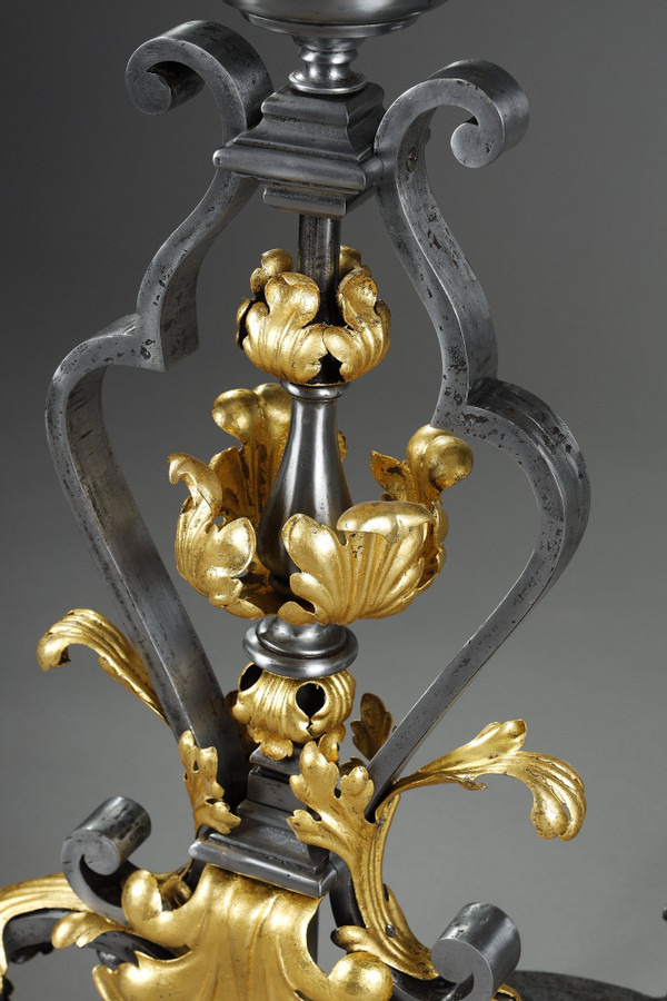 VERY LARGE PAIR OF WROUGHT IRON MANTELPIECES WITH FOLIAGE, MASK AND SCROLL MOTIFS