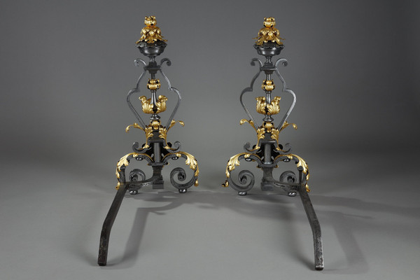 VERY LARGE PAIR OF WROUGHT IRON MANTELPIECES WITH FOLIAGE, MASK AND SCROLL MOTIFS