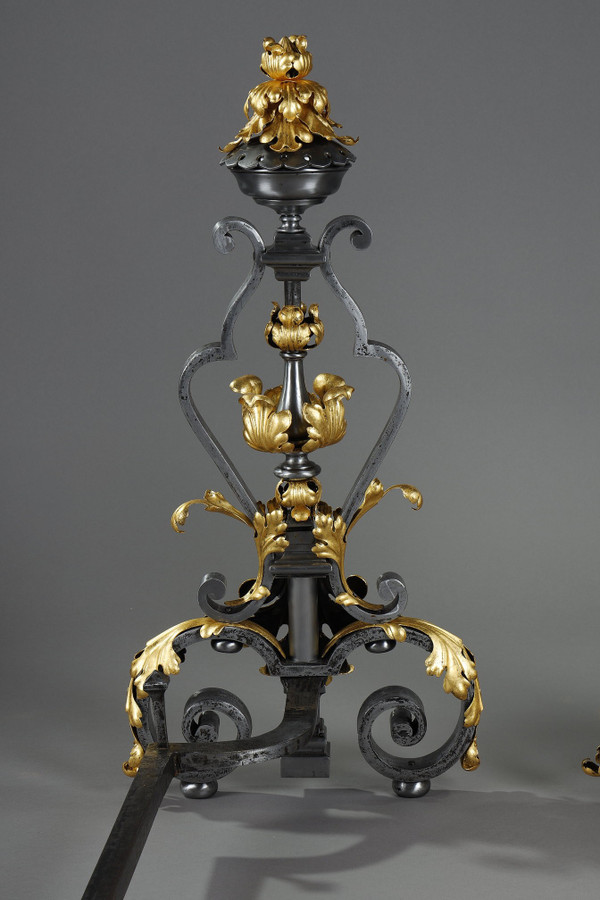 VERY LARGE PAIR OF WROUGHT IRON MANTELPIECES WITH FOLIAGE, MASK AND SCROLL MOTIFS