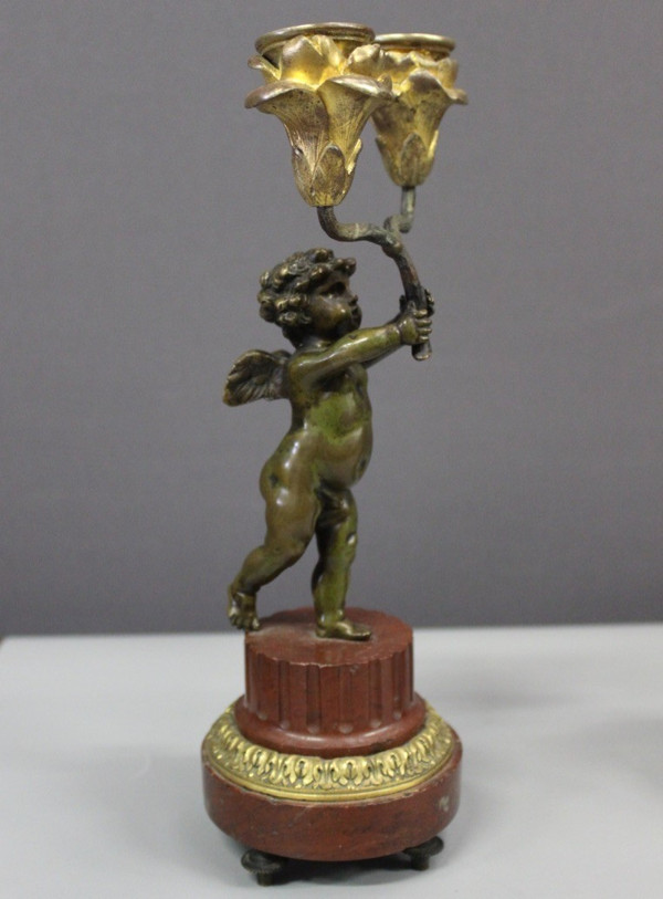 Borne Clock Surmounted by a Putti About 1880