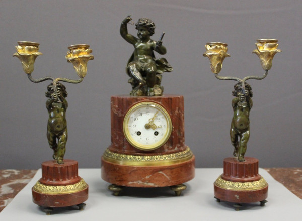 Borne Clock Surmounted by a Putti About 1880