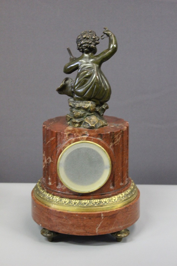 Borne Clock Surmounted by a Putti About 1880