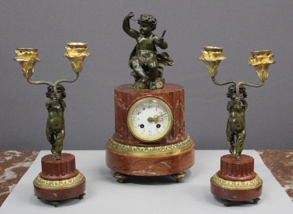 Borne Clock Surmounted by a Putti About 1880