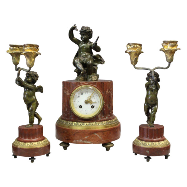 Borne Clock Surmounted by a Putti About 1880