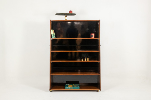 Libreria bifacciale con rotelle in palissandro. Circa 1960. LS58761008H